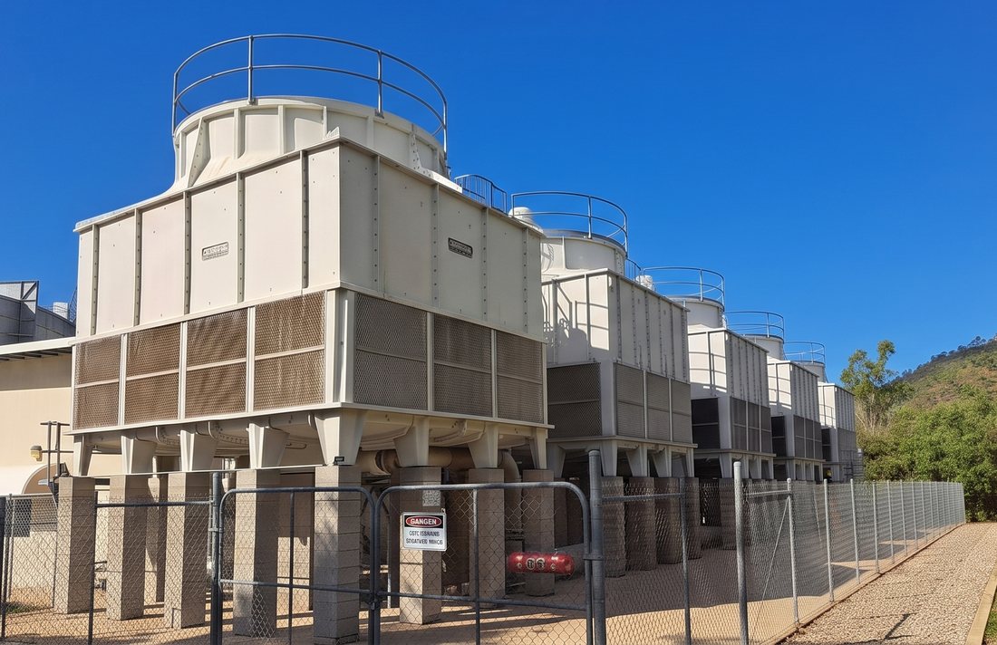 Row of industrial cooling towers