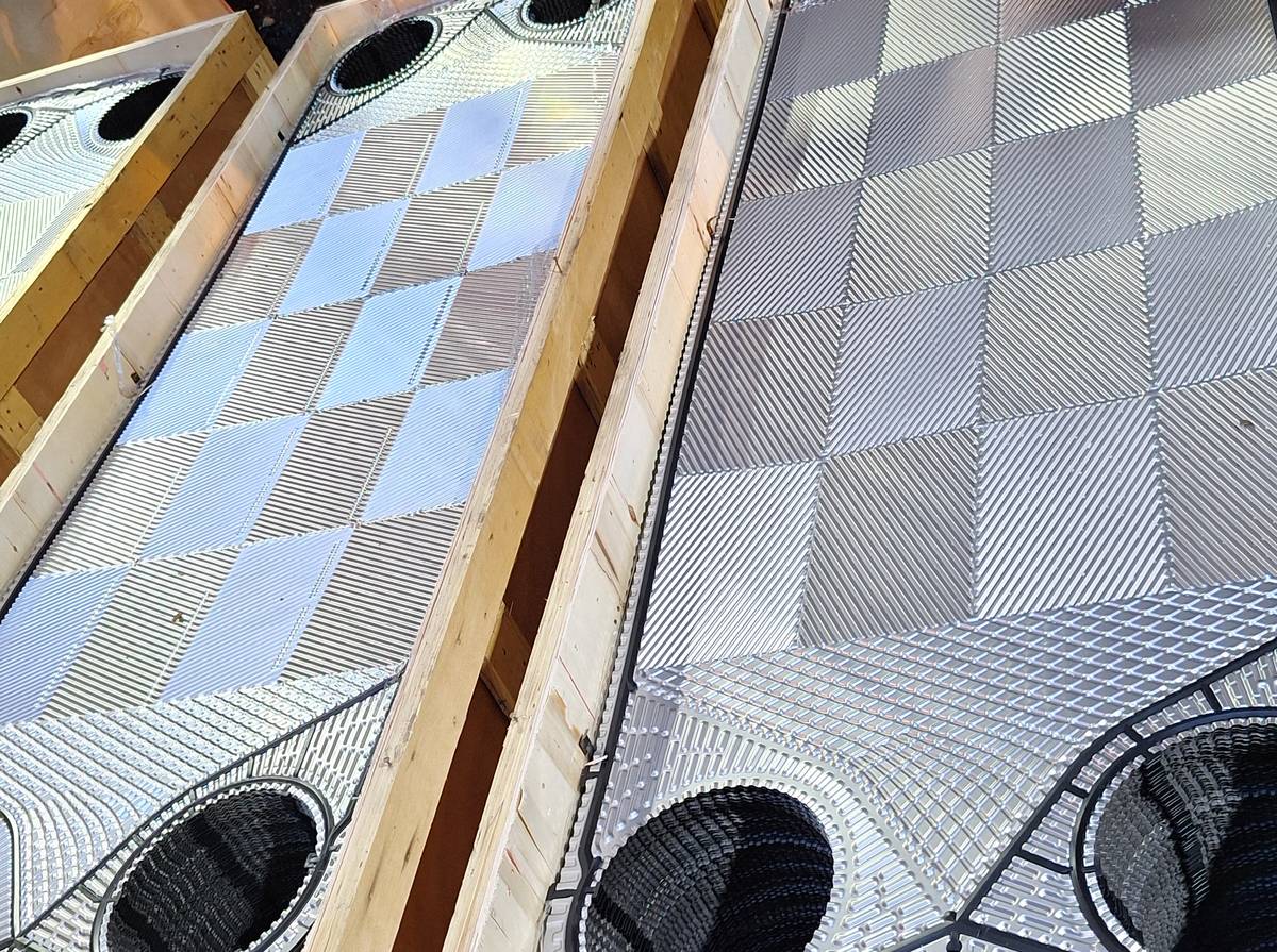 Replacement plate heat exchanger plates in shipping crates